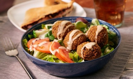 Middle Eastern Food and Drink for Takeout and Dine-In at Mordy's Falafel (Up to 30% Off). Two Options Available.