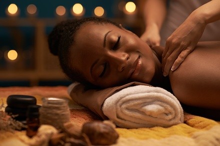 60-Minute Deep-Tissue Massage w/ Salt or Sugar Foot Scrub at A Touch With Love (Up to 28% Off). Two Options.