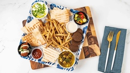 Food and Drink at Falafel x Bar, Takeout, and Dine-In if Available (Up to 26% Off). Two Options Available.