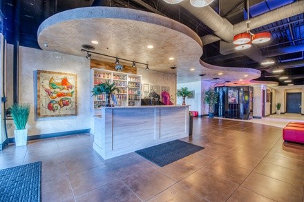 One Month of UV Tanning or Red-Light Treatments, or Two Mystic HD Spray Tans at Tan Your Hide (Up to 64% Off)