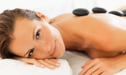 Up to 37% Off on Hot Stone Massage at Helping Hands Massage & Wellness