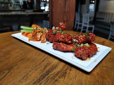 Up to 50% Off on American Cuisine at Landon's East meets West