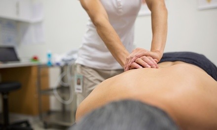 One 60-Minute Massage or Consultation at Four Points Family Chiropractic (Up to 84% Off). Two Options Available.