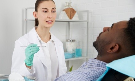 Exam, Cleaning, and Extras at Dental Care East Hanover (Up to 88% Off). Two options Available