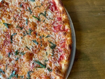 Up to 38% Off on Pizza at Paper Plane Pizza