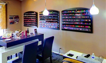 Basic Manicure, Basic Mani-Pedi, or No-Chip Manicure with Deluxe Spa Pedicure at Koi Nail Spa (Up to 12% Off)