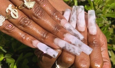 Up to 32% Off on Nail Spa/Salon - Nail Design at dollhouse nail bar